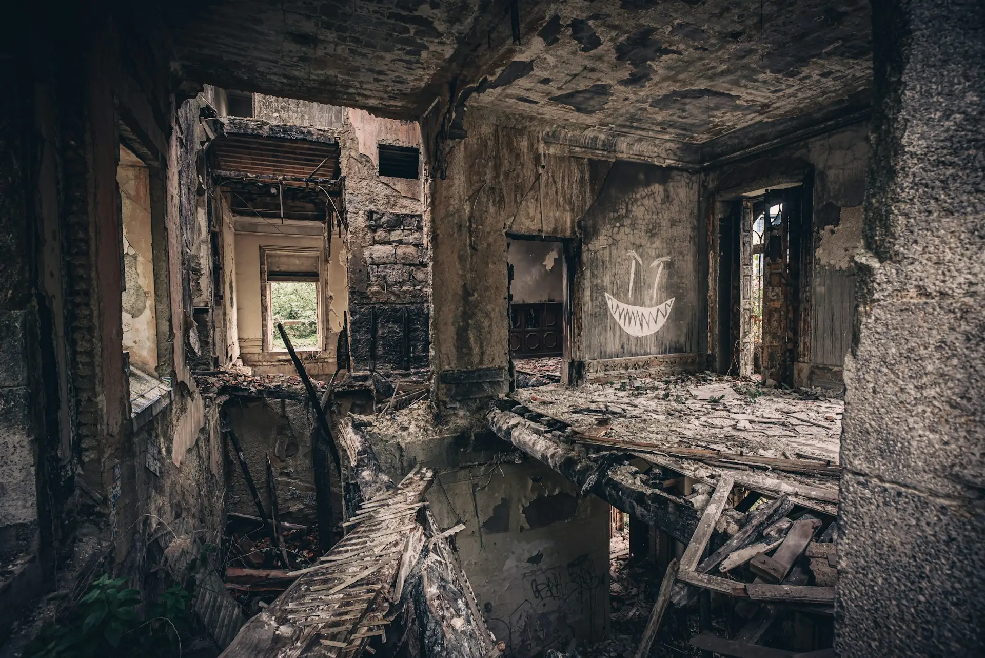Interior belongings inside a fire-damaged building that need quick assessment and protection.